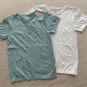 NWOT Puma Women Teal and White Short Sleeve Seamless Tees